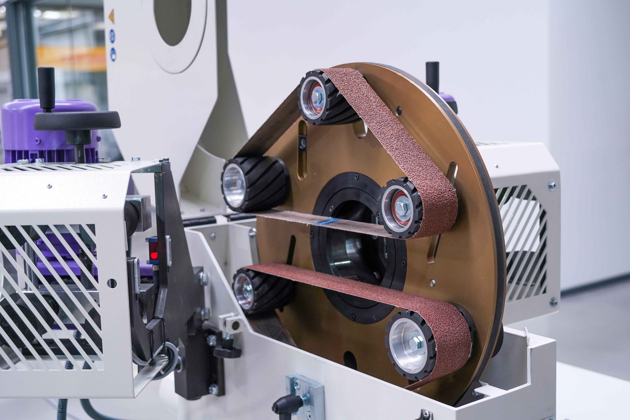 abrasive-belt-on-wheel-for-round-tube-grinding_11zon-scaled